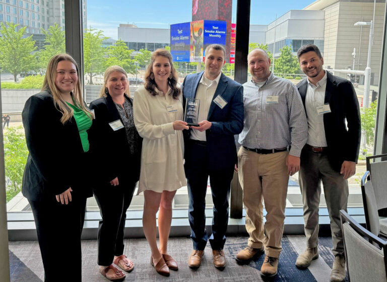 PC team accepts CMAA New England Project Achievement Award